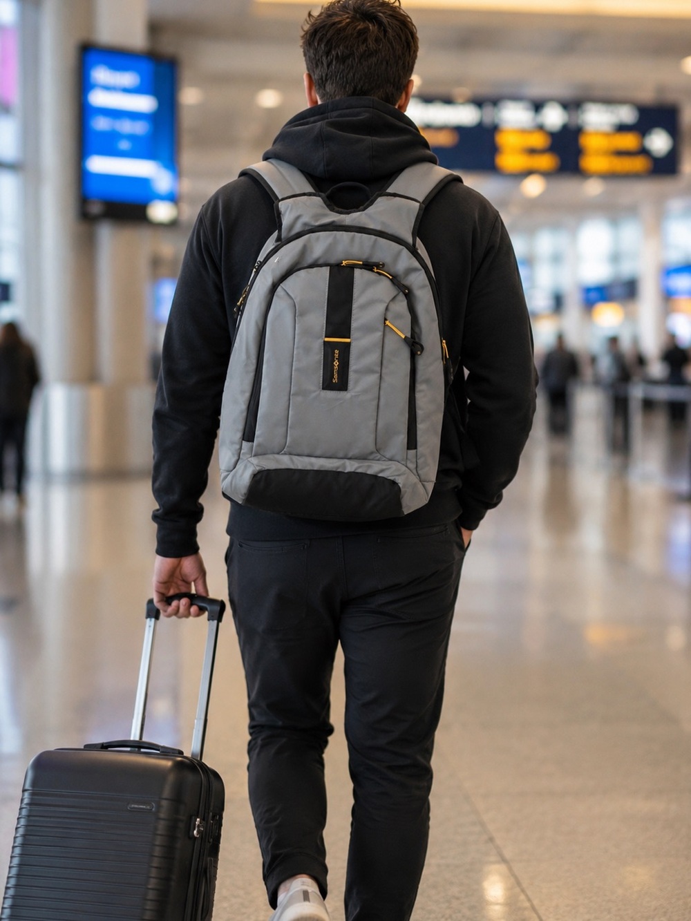 Samsonite Gray Backpack with Black Accents and Gold Zippers